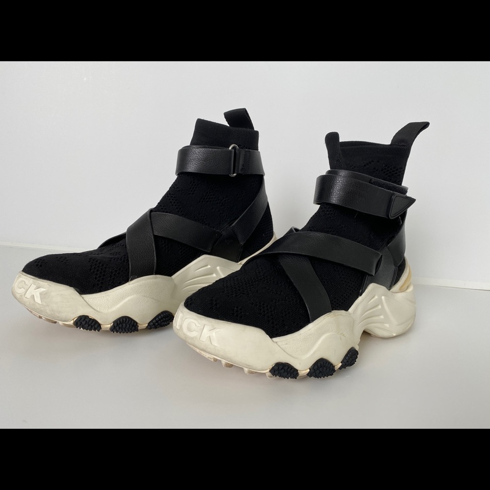 The Kooples x Slick Woods Used high-top trainers.